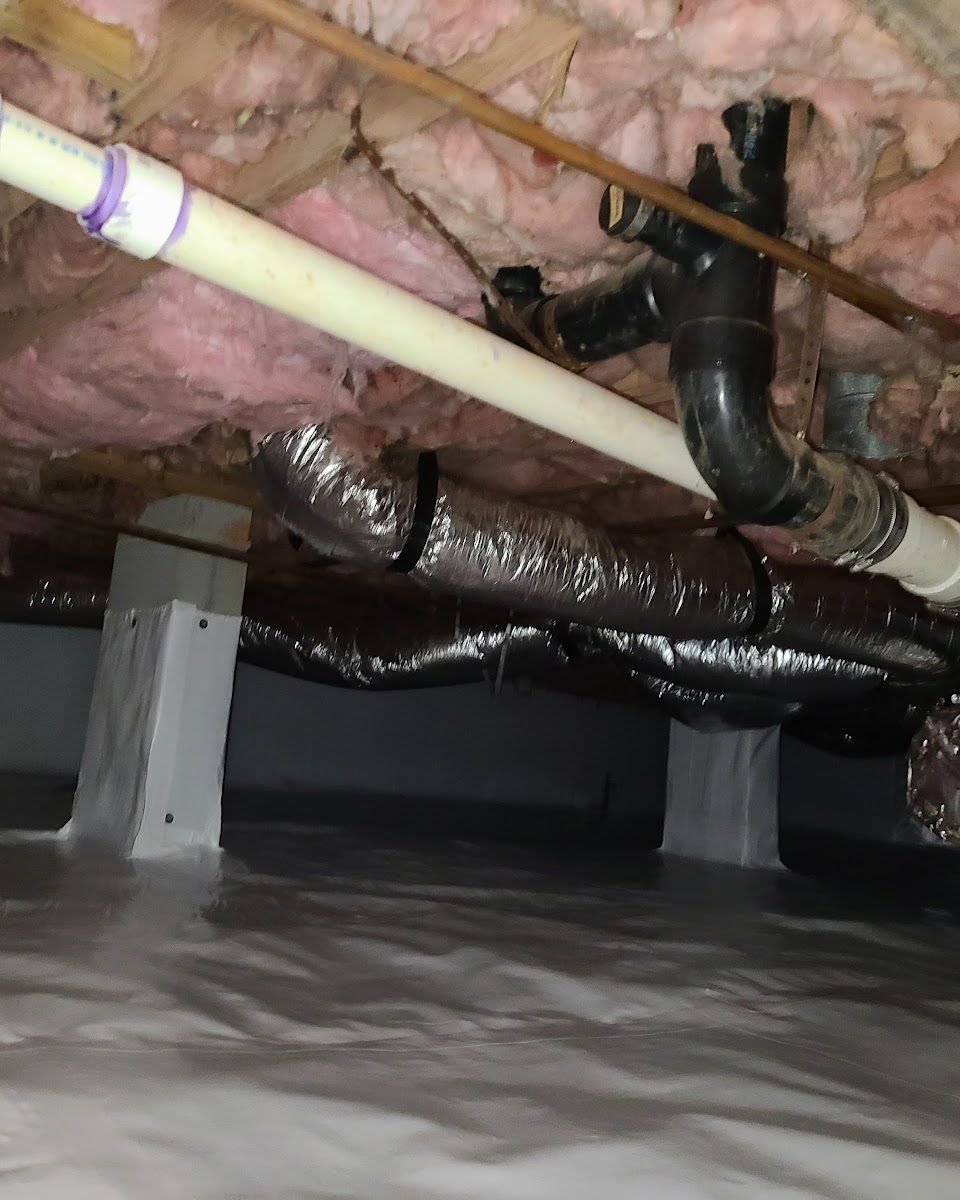 Ductwork and plumbing running through an encapsulated crawl space, Asheville NC